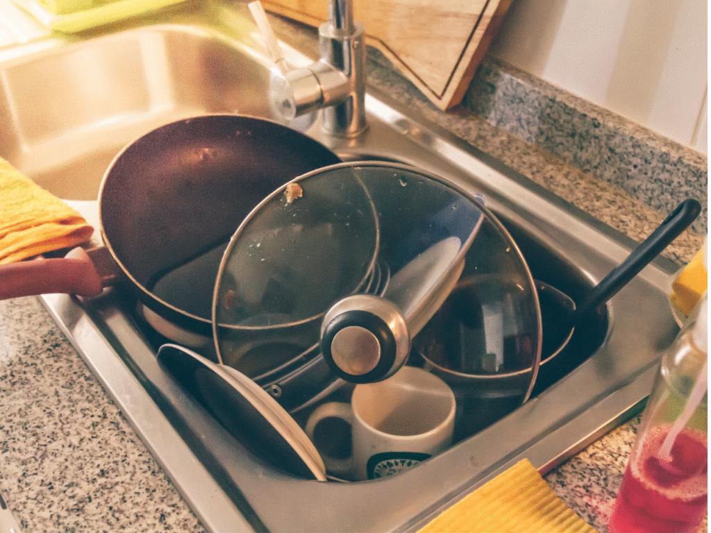 Because no real kitchen stays spotless—dirty pans, a mug, and a plate keeping it honest.
